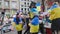 FRANKFURT AM MAIN, GERMANY- APRIL 10, 2022: peaceful rally in support of Ukraine, people with national flags of Ukraine