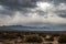 Franklin Mountains under dark gloomy sky