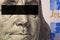 Franklin`s face close-up with a black stripe of censorship on his eyes on a fragment of a 100 dollar bill of the new sample