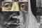 Franklin`s face close-up with a stripe of censorship on his eyes on a 100 dollar bill. Unusual, partially black and white,