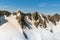 Franz Josef glacier rock mountain slope with blue sky background, New Zealand