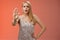 Freaked out displeased bothered insecure blond woman in silver glittering dress extend palm stop enough prohibition