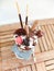 Freakshake, a kind of gourmet Milkshake with topping : donut, whipped cream, chocolate ball, wafer biscuits, candy, mikado, mini i