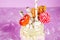 Freakshake from pink smoothie, cream. Monstershake with lollipops, waffles and marshmallow. Extreme milkshake in a Mason jar. Pink