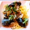 Frech homemade spaghetti pasta with vongole sea sheels, mussles and parsley