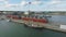 Frederikshavn, Denmark, may 21 2022: Aerial view, old  wooden sailboat moored at the quays in the port.