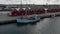 Frederikshavn, Denmark, may 21 2022: Aerial view, old wooden ship is moored in the port at the quay