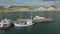 Frederikshavn, Denmark, may 21 2022: Aerial view, ships moored at the quays in the port, calm spring evening.