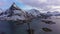 Fredvang Bridge and Volandstind Mountain in Winter. Lofoten, Norway. Aerial View