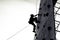 Free climber child young boy practicing on artificial boulders