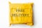 FREE DELIVERY text on yellow parcel package or cargo box with product, free logistic shipping and distribution