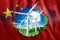 Free energy, windmills against the background of nature and the flag of China. The concept of clean energy, renewable energy