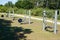 Free outdoor gym grey exercise stations in public park with outdoors gym equipment in park fitness area sports ground