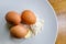 Free range eggs seen with flour and butter for making a cake.