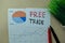 Free Trade write on sticky notes isolated on office desk