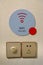 Free WiFi sign and electric outlet set or power sockets on the wall in hotel