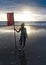 Free woman enjoying freedom feeling happy at beach at sunset. Beautiful serene relaxing woman in pure happiness and