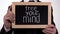 Free your mind phrase on blackboard in businessman hands, creative approach