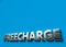 Freecharge word as 3D sign or logo concept placed on blue surface with copy space above it. Freecharge technologies concept. 3D