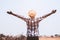 Freedom african man standing with arms raised up