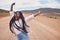 Freedom, excitement and mockup with a black woman dancing in the desert for fun during a road trip. Travel, dance and