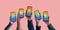 Freedom to Expression for LGTBQ Concept. Group of Diversity People showing Pride Text on Rainbow Color inside a Smartphone