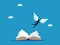 Freedom to learn and imagine. man flying with angel wings coming out of a book