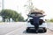 Freedom traveler man wearing facemask and sitting on car with hightway road background