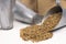 Freekeh in a grain scoops in white background close