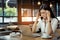 Freelance asian woman headache tired,stess or deadline with digital laptop
