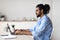 Freelance Career. Millennial Arab Guy Working On Laptop In Home Office