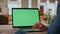 Freelancer hands swiping chromakey laptop at office closeup. Man reading news