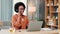 Freelancer, remote worker and call center agent typing on a laptop and smiling while wearing a headset. Female