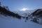 Freerider snowboarder climbs a snowy path up, skitour in Svaneti, Georgia