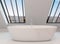 Freestanding modern bathtub under view windows