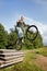 Freestyle young male jumping from concrete blocks.