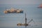 Freetown, Sierra Leone - January 09, 2014: Old and abandoned ships and ship wrecks rusting away at coast of Sierra Leone