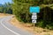 Freeway entrance sign in a pine forest