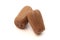 Freeze Dried Brown Chocolate Candy Rolls on a White Background