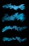 Freeze motion of blue dust explosions on black