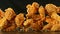 Freeze motion of flying pieces of fried chicken pieces