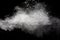 Freeze motion of white dust particles splash on black background.White powder explosion clouds