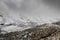 Freezing Nida Plateau Wilderness under massive thunderstorm clouds cumulus. Psiloritis mountain frozen heights