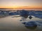 Freezing sea shore in the romantic evening light