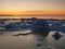 Freezing sea shore in the romantic evening light