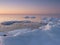 Freezing sea shore in the romantic evening light