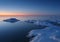 Freezing sea shore in the romantic evening light