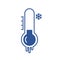 Freezing temperature on blue thermometer with snow sign