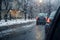 Freezing transformation car window captures mixed rain snow street scene