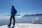 Freiberg - Man enjoying panoramic view from summit Freiberg of Karawanks, Julian Alps, in Carinthia, Austria. Snow shoe